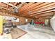 Interior of garage features ample space, a red classic car and workbench at 1325 Fordice Rd, Lebanon, IN 46052