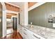 Functional pantry featuring granite countertops, built-in cabinets, and easy access to the kitchen at 1325 Fordice Rd, Lebanon, IN 46052