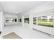Bright sunroom with lots of windows offering natural light and views of the front yard at 1325 Fordice Rd, Lebanon, IN 46052