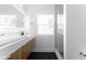 Bright bathroom showcasing a double vanity, sleek design, and modern fixtures at 1425 Kennington St, Indianapolis, IN 46225