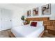 Cozy bedroom featuring a rustic wooden headboard and modern decor at 1425 Kennington St, Indianapolis, IN 46225