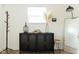 Stylish entryway with a decorative cabinet and modern decor at 1425 Kennington St, Indianapolis, IN 46225