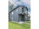 Charming two-story home with well-manicured lawn and modern architectural details at 1425 Kennington St, Indianapolis, IN 46225
