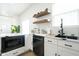 Bright kitchen with white cabinets and modern appliances at 1425 Kennington St, Indianapolis, IN 46225