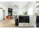 Open-concept kitchen with a view into the adjacent living area at 1425 Kennington St, Indianapolis, IN 46225
