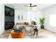 Cozy living room with fireplace, modern furniture, and ample natural light at 1425 Kennington St, Indianapolis, IN 46225