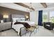 Bedroom with tray ceilings, beams, neutral decor, large windows, and accent lighting at 1452 E Greyhound E Pass, Carmel, IN 46032