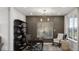 Modern home office with textured wallpaper, modern lighting, and lots of natural light at 1452 E Greyhound E Pass, Carmel, IN 46032