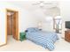 Bright bedroom featuring vaulted ceilings, a striped comforter and a green nightstand at 1595 N 400 W, Greenfield, IN 46140