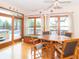 Inviting dining area with hardwood floors, and access to the outdoor deck, pool and hot tub at 1595 N 400 W, Greenfield, IN 46140