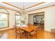 Dining area with hardwood floors, chandelier, and views to the outside at 1595 N 400 W, Greenfield, IN 46140