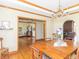 Open dining area with hardwood floors and views into other rooms at 1595 N 400 W, Greenfield, IN 46140