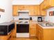 Functional kitchen featuring a range, and a stainless steel sink at 1595 N 400 W, Greenfield, IN 46140