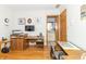 Home office with hardwood floors and a view into the bathroom at 1595 N 400 W, Greenfield, IN 46140