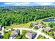 Wide aerial view of a suburban community featuring green spaces, and mature trees at 1631 Caspian Dr, Carmel, IN 46032