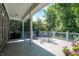 Back porch featuring a table, chairs, and grill, perfect for relaxation and outdoor enjoyment at 1631 Caspian Dr, Carmel, IN 46032