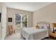 Bedroom featuring carpet, neutral walls, a double window, iron bed frame and door leading to hallway at 1631 Caspian Dr, Carmel, IN 46032