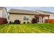 Backyard view of the home featuring a pergola and nice lawn space at 17183 Petersfield Ln, Westfield, IN 46074