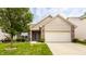 Charming single-Gathering home featuring manicured lawn, brick accents, and an attached two-car garage at 17183 Petersfield Ln, Westfield, IN 46074