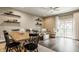 Cozy living area featuring wood-look floors and a large sliding door to the outdoors at 17183 Petersfield Ln, Westfield, IN 46074