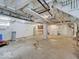 Large unfinished basement area with exposed ceiling and utility connections at 1908 W Northgate St, Indianapolis, IN 46228