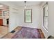 Cozy dining area adjacent to the kitchen with natural light and hardwood floors at 1908 W Northgate St, Indianapolis, IN 46228