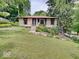 Charming single-story home features a well-maintained yard and inviting front entrance at 1908 W Northgate St, Indianapolis, IN 46228