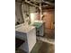 Basement laundry area with washer, dryer, utility sink and tile floor at 2211 Rosedale Dr, Indianapolis, IN 46227