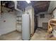 This basement has painted walls and wooden support beams with mechanical equipment at 238 S 5Th Ave, Beech Grove, IN 46107