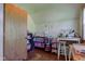 This bedroom features warm colors, storage, and natural light at 238 S 5Th Ave, Beech Grove, IN 46107