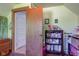 This comfortable bedroom features a large door and plenty of shelf space at 238 S 5Th Ave, Beech Grove, IN 46107