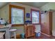 This room features warm colors, natural light, and lots of storage at 238 S 5Th Ave, Beech Grove, IN 46107