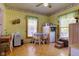 Cozy dining area with a table, chairs, and large windows offering natural light at 238 S 5Th Ave, Beech Grove, IN 46107