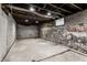 Unfinished basement featuring brick and concrete block walls at 2954 N Washington Blvd, Indianapolis, IN 46205