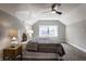 Cozy bedroom with carpeted floors, a ceiling fan, and a queen bed at 2954 N Washington Blvd, Indianapolis, IN 46205