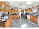 Spacious kitchen with ample counter space, wood cabinets, and modern appliances for efficient meal preparation and cooking at 3001 W 226Th St, Sheridan, IN 46069