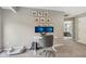 Comfortable bedroom area, ideal for a home office, with dual monitors and a dog bed at 301 Cobblesprings Ct, Avon, IN 46123