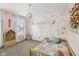 Charming bedroom with floral wallpaper, bright, airy, and perfect for a little girl at 301 Cobblesprings Ct, Avon, IN 46123