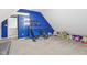 A recreational bonus room with gaming setup and ample space for playing at 301 Cobblesprings Ct, Avon, IN 46123