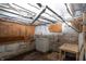 An unfinished basement with exposed pipes and wires at 320 N Colorado Ave, Indianapolis, IN 46201