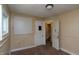 Bedroom with drab walls, window and outdated carpeting at 320 N Colorado Ave, Indianapolis, IN 46201