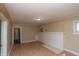 Inviting living room with hardwood floors and a classic brick fireplace at 320 N Colorado Ave, Indianapolis, IN 46201
