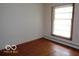 Bright bedroom with hardwood floors, offering a clean and versatile space for your needs at 3253 W 34Th St, Indianapolis, IN 46222