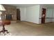 Open-concept living room with stone fireplace at 3253 W 34Th St, Indianapolis, IN 46222