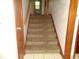 View of carpeted stairs leading to the next level at 3253 W 34Th St, Indianapolis, IN 46222