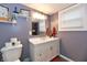 Stylish bathroom with a modern vanity, updated fixtures, and a window at 335 Park St, Noblesville, IN 46060