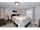 Serene bedroom with neutral colors, comfortable bed, and soft lighting at 335 Park St, Noblesville, IN 46060