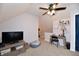 Cozy bedroom features carpet, natural light, a study area, and a comfortable pet bed at 335 Park St, Noblesville, IN 46060