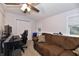 Relaxing bedroom featuring a workspace, a sofa, and a closet at 335 Park St, Noblesville, IN 46060