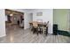 Cozy dining area with stylish table and chairs, open to the living room at 335 Park St, Noblesville, IN 46060